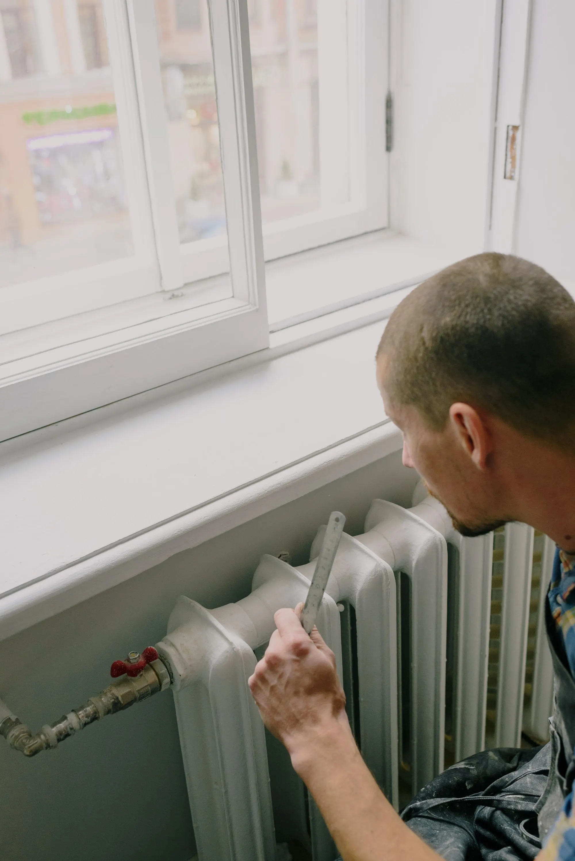 Contrôle d’un radiateur sous une fenêtre
